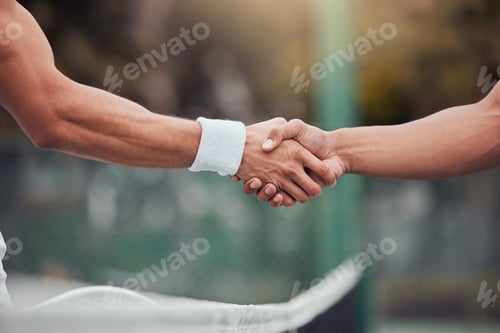 Preview: Two unknown ethnic tennis players shaking hands before playing court game. Fit athletes team standi