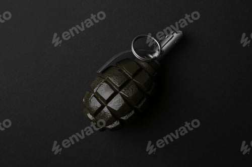 Preview: Hand grenade on black background, top view