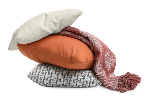 Preview: Stylish soft pillows and blanket on white background