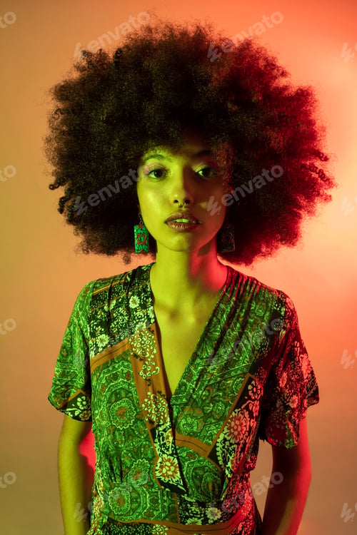 Preview: Portrait young beautiful multiethnic woman studio shot on colorful background