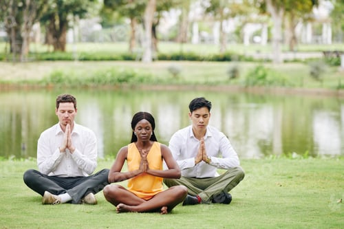 Preview: Business people practicing yoga