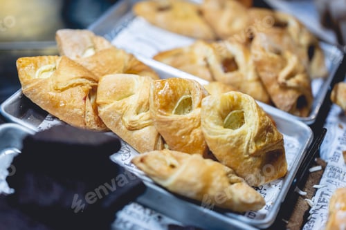 Preview: Closeup shot of gourmet pastries on a platter