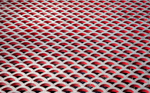 Preview: Abstract pattern of red and white circular grid structure. Painted mezzanine platform