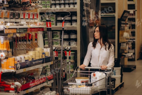 Preview: Woman Shopping in a hardware store