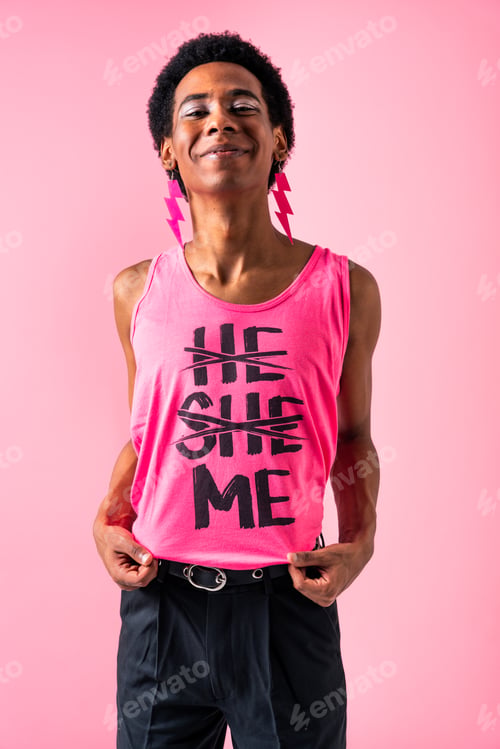 Preview: Fashionable fluid gender man posing in studio