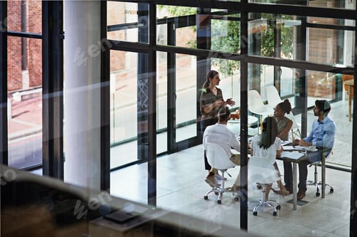 Preview: Shot of a group of businesspeople having a meeting in a boardroom