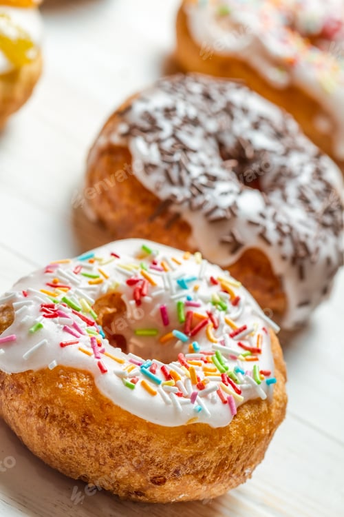 Preview: Closeup of freshly baked colorful donuts