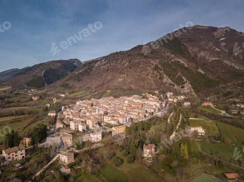 Preview: Bird's eye view of the medieval village of Costacciaro at the foot of Mount Cucco in Italy
