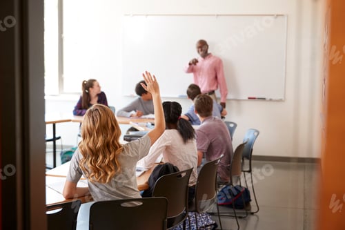 Preview: View Through Doorway Of High School Tutor At Whiteboard Teaching Class