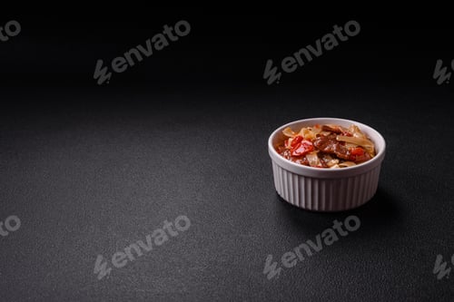 Preview: Delicious Beef and Noodles on Black Background