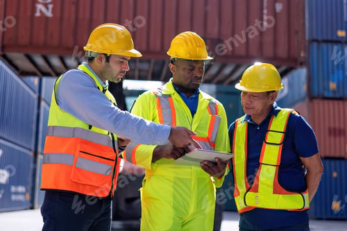 Preview: Engineer working in container storage yard stand front of container lift truck ready to delivery