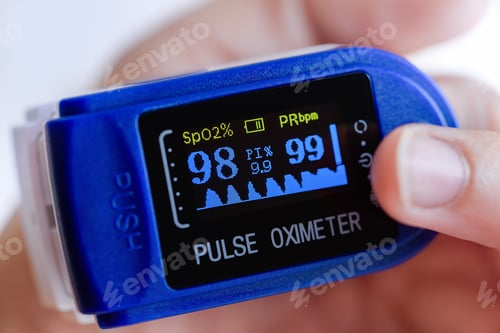 Preview: Pulse Oximeter Display Closeup on finger. Covid-19, healthcare concept