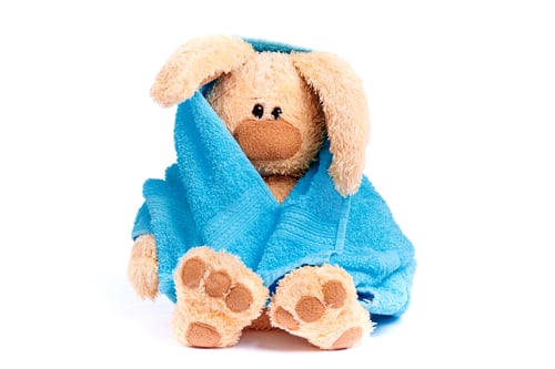 Preview: Stuffed rabbit in a blue towel