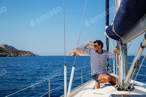 Preview: Young man on sailiboat