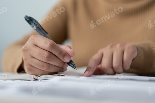 Preview: Woman do home money account calculate on book