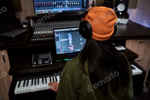Preview: Woman Working in a Music Recording Studio