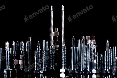 Preview: A fantastic city made of bolts, nuts, screws and self-cuts on a black background with reflection