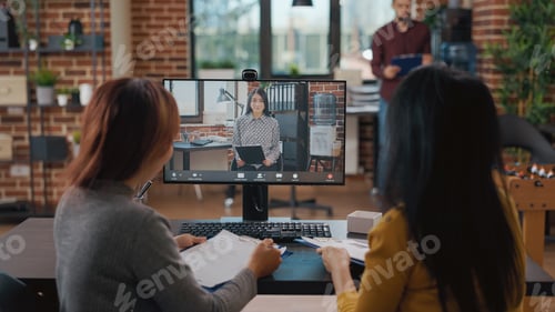 Preview: Team of asian women meeting with candidate on video conference call