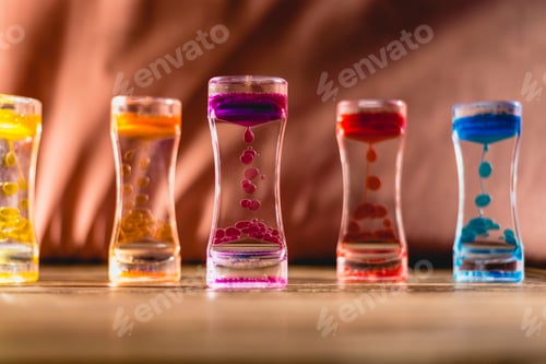 Preview: Toy with water and drops of oil colors.