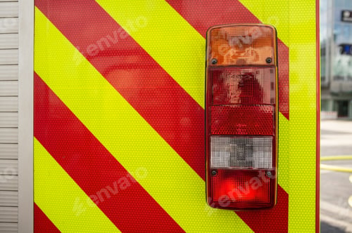 Preview: Close-up fire truck, with red lights for safe driving, outdoors.