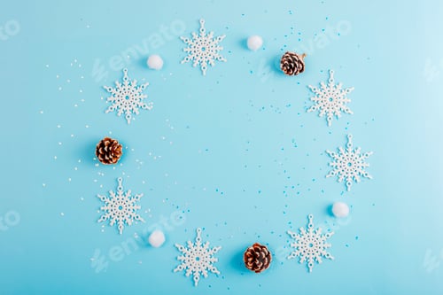Preview: Snowflakes, pinecones, and pom-poms on a light blue background