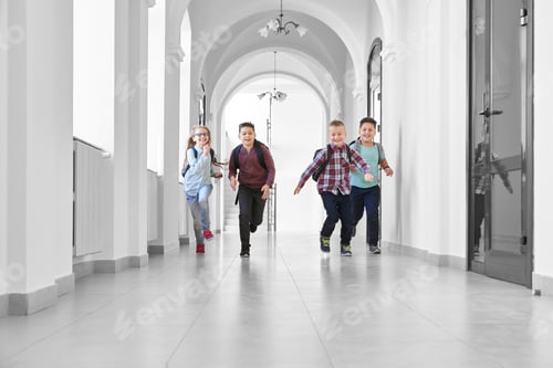 Preview: Pupils playing together and running on school corridor
