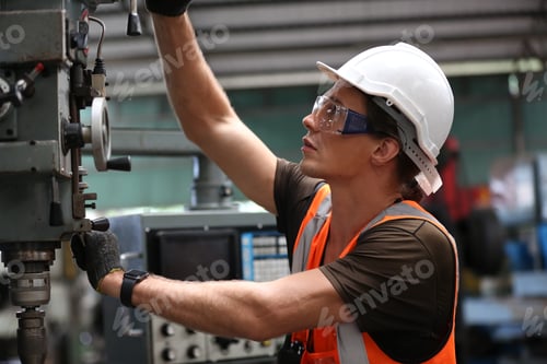 Preview: industrial factory employee working in metal manufacturing industry