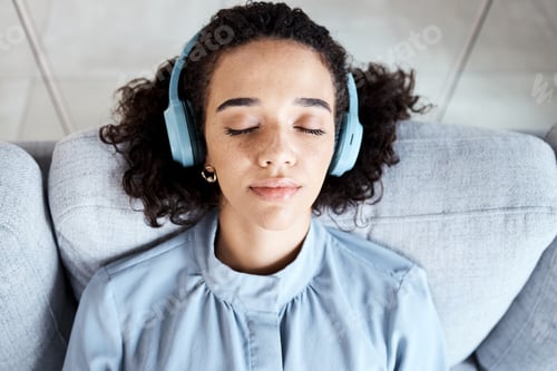 Preview: Woman, face and headphones for listening to music for calm, peace and mindfulness on home couch. Yo