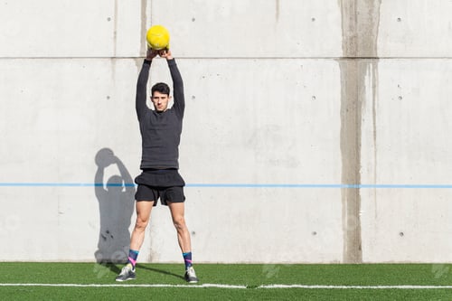 Preview: Man training with ball near wall