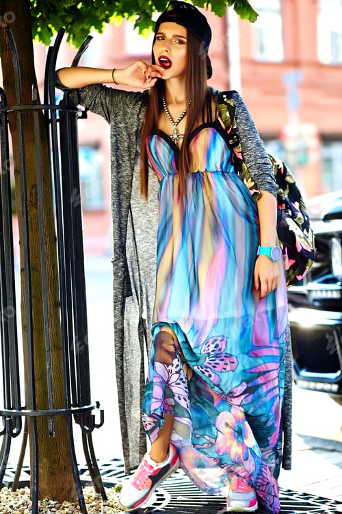 Preview: Portrait of young stylish woman posing outdoors