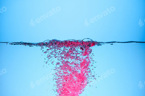 Preview: pink bubbles in water, isolated on blue