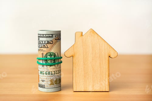 Preview: Money and Wood House Model on Table