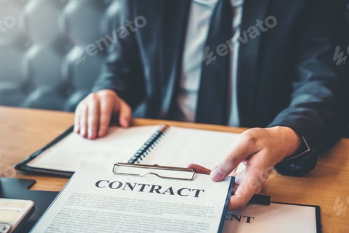 Preview: Business people negotiating a contract between two colleagues