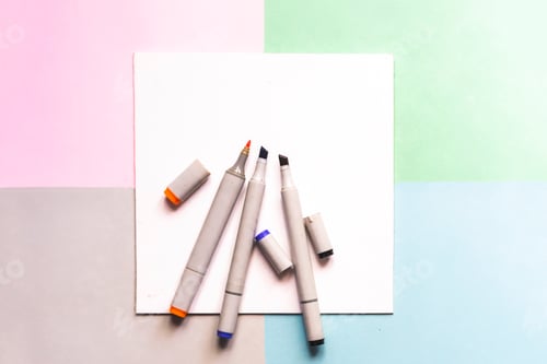 Preview: top view of color painting markers on the office creative art layout concept with soft colours d