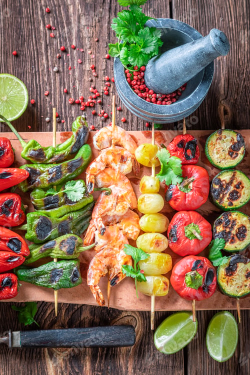 Preview: Healthy grilled skewer with vegetables and seafood.