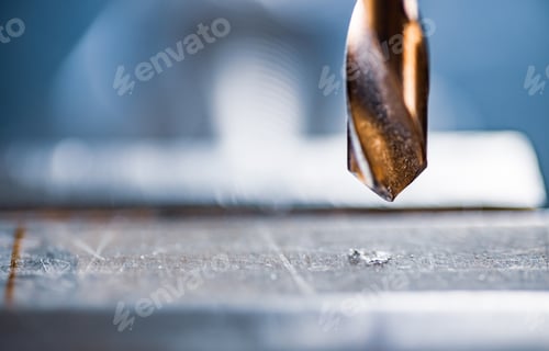 Preview: Drill close-up at the workplace in workshop