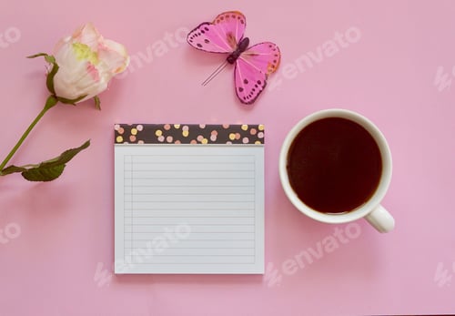Preview: Pink things Notepad, coffee, pink rose and a pink butterfly on a pink background