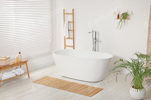 Preview: Stylish bathroom interior with ceramic tub and houseplants