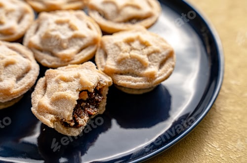 Preview: Closeup of mince pies served on a dish, a traditional Christmas dessert