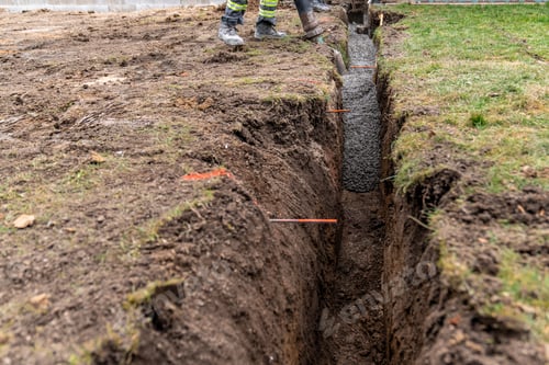 Preview: cementing the foundation in the ground when building a house