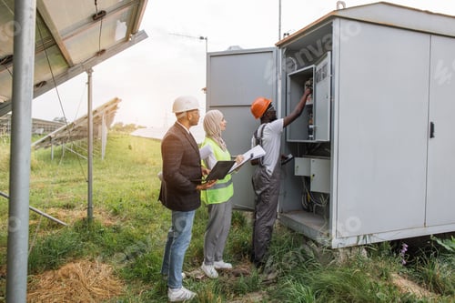 Preview: Multiracial people doing inspection on solar farm