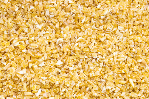 Preview: background - crushed polished wheat grains