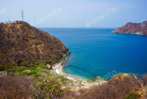 Preview: Beautiful blue water and mountains in Santa Marta, Colombia.