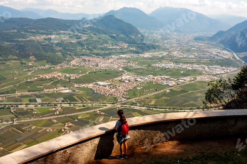 Preview: Little girl admires the Adige Valley from a Fai della Paganella viewpoint