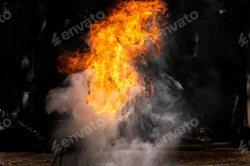 Preview: Flames caused by the explosion of the oil. Demonstration of water on oil fire.