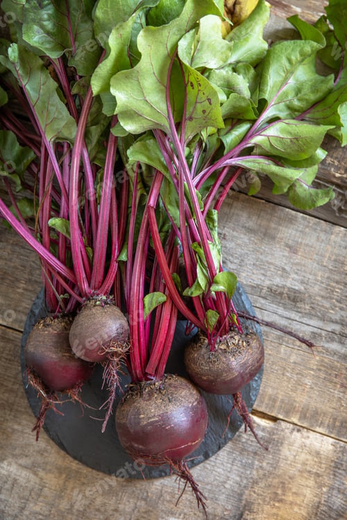 Preview: Fresh organic ripe juicy beetroot (beets) on a wooden kitchen table. Photo nominated.
