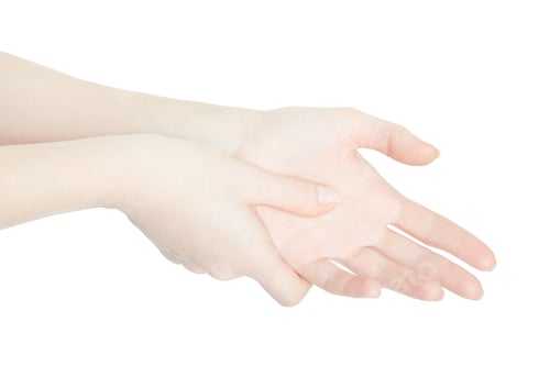 Preview: Woman hand touching with thumb the painful palm on white