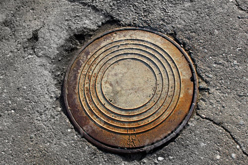 Preview: rusty round manhole