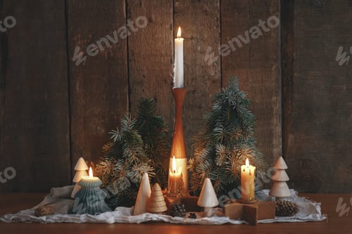 Preview: Christmas advent. Stylish burning christmas candles, pine trees and cones on rustic wood background