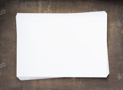 Preview: stack of paper empty pages on wood